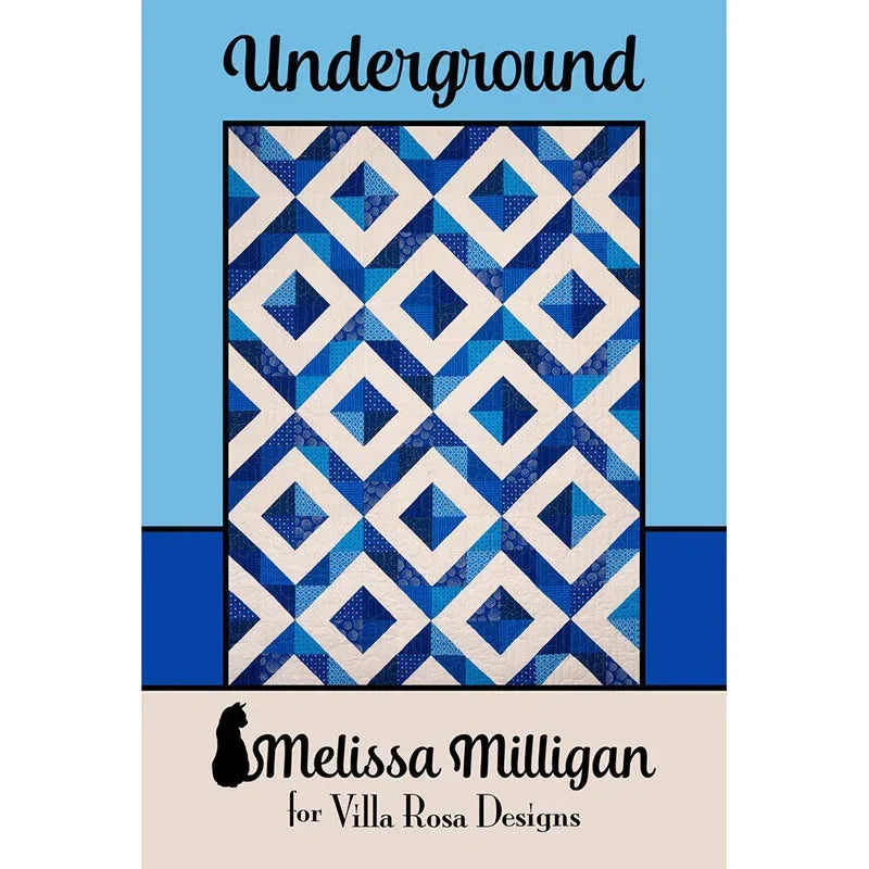Quilt pattern featuring repeating blue and white diamond squares