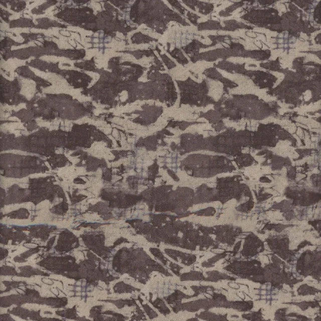Abstract fabric swatch with dark brown and cream camouflage-like pattern