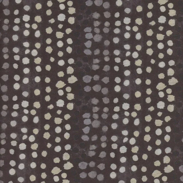Dark fabric swatch with scattered white and cream dot pattern