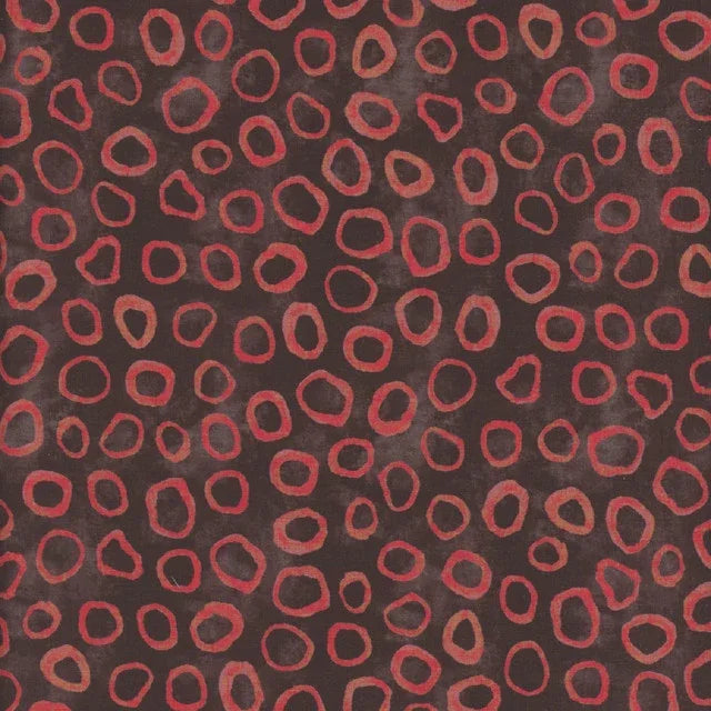 Sketchbook page with repeating ember-red oval ring pattern on dark background