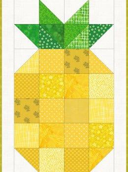 Pineapple quilt block with green top, yellow body, and patchwork grid squares