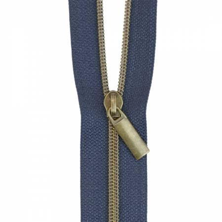 Nylon coil zipper tape with antique brass-tone pull, navy blue