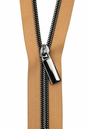 Gunmetal coil zipper with metal pull tab, close-up