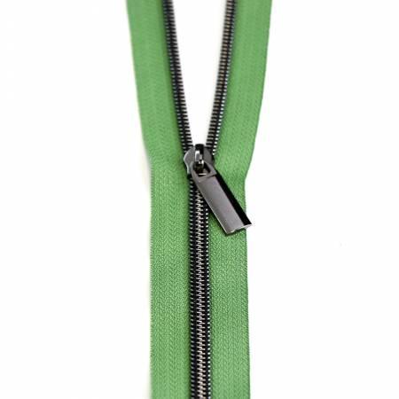 Coil zipper with green tape and gunmetal metal pull