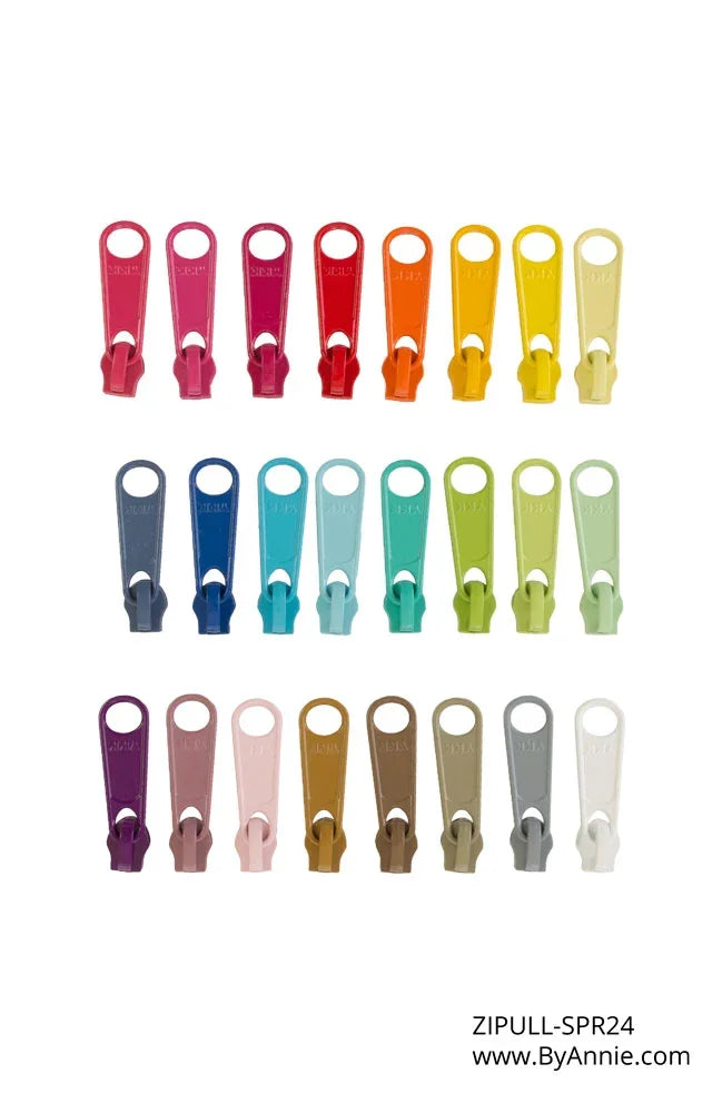 Multi-color zipper pull set with assorted spring-shaped plastic pulls