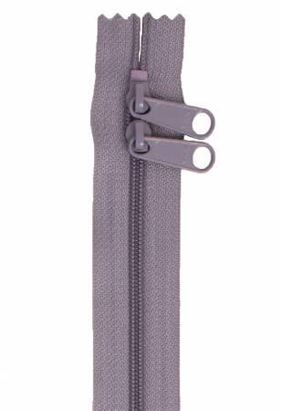 Gray double-slide handbag zipper with two metal pulls and stitched tape