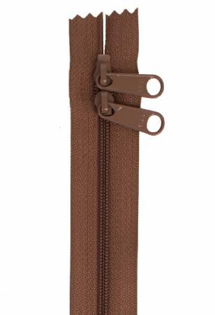 Handbag zipper with seal brown tape and two white metal pull tabs