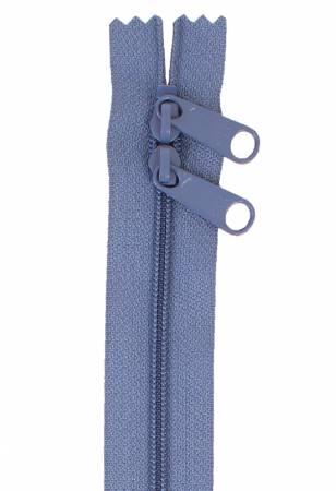 Blue double-slide handbag zipper with two circular pull tabs