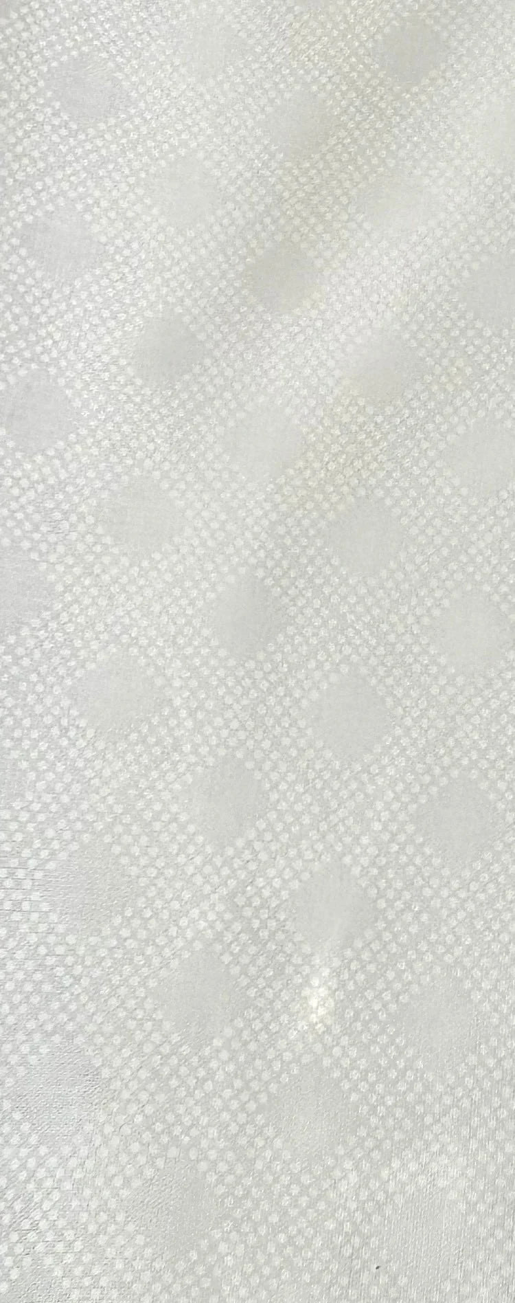 Light gray diamond-pattern fabric swatch with small repeating shapes