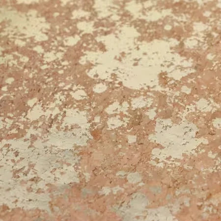 Lightweight cork fabric with natural gold and tan splatter speckle pattern texture