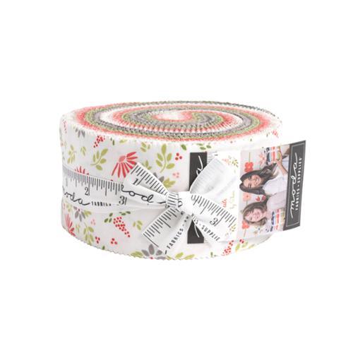 Christmas jelly roll fabric bundle with red, green, and white holiday motifs