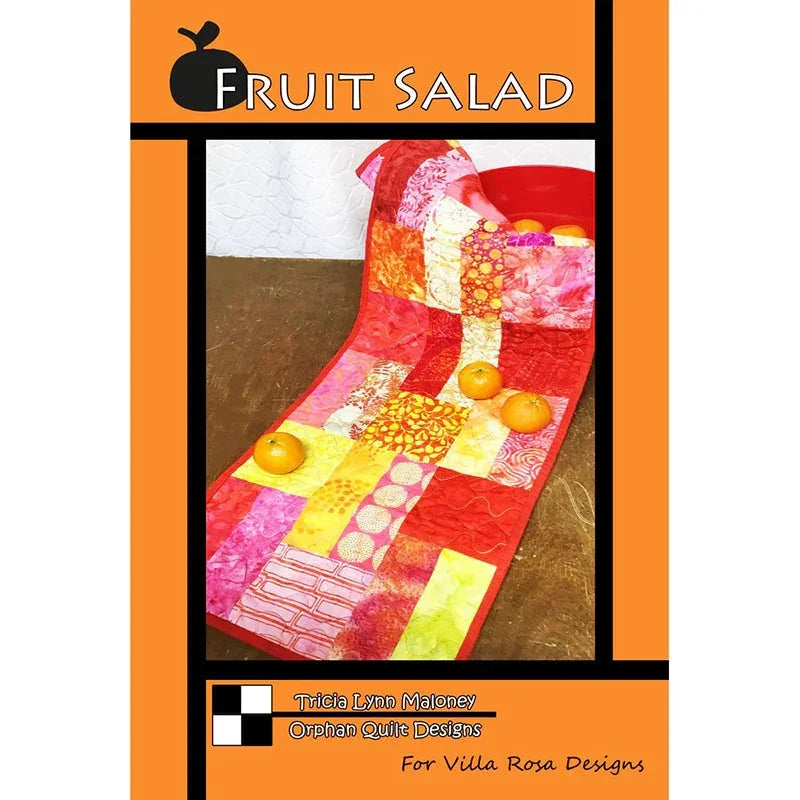 Fruit Salad tablerunner quilt pattern cover with colorful pink and yellow patchwork runner