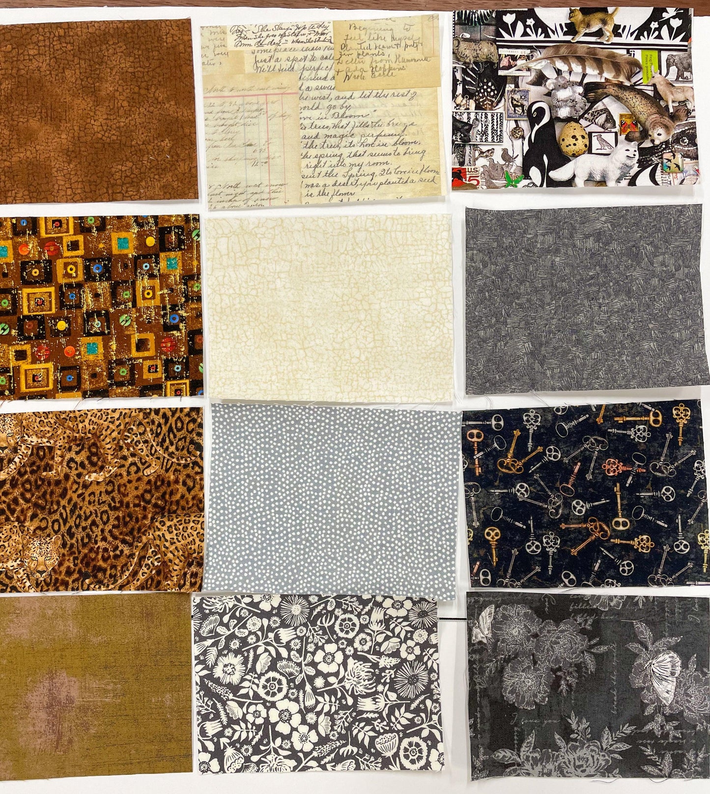 Fabric swatch pack with brown, cream and black patterned squares, various textures
