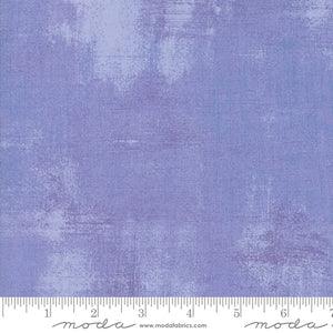 Lavender textured fabric swatch with subtle mottled weave