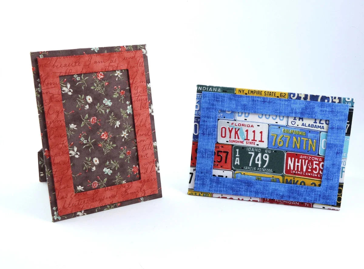 Two fabric photo frames: red dark-floral center and blue license-style border