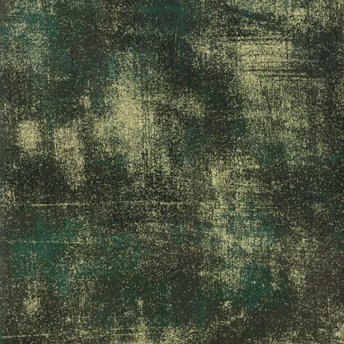 Grunge Christmas green fabric remnant with mottled, distressed texture
