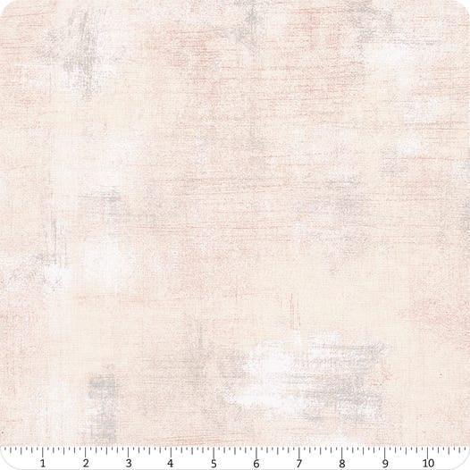 Pale roebuck grunge fabric remnant with subtle distressed texture, 17" width