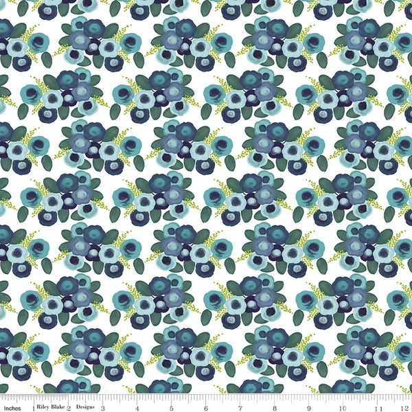 White floral fabric with blue and teal roses and green leaves, repeating pattern