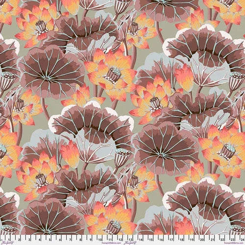 Floral fabric yardage with brown, peach, and white blossoms and leaf motifs