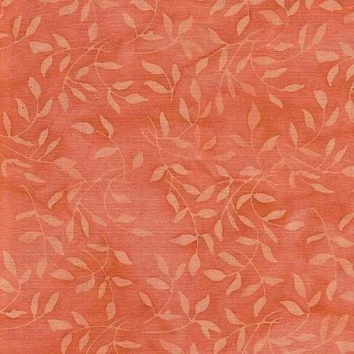 Batik cotton yardage in coral pink with mini leaf pattern