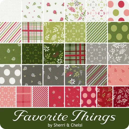 Christmas fabric bundle of coordinated patchwork squares in green, red, and white