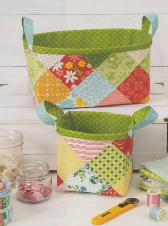 Patchwork fabric zip pouches with green, yellow, and patterned patch panels