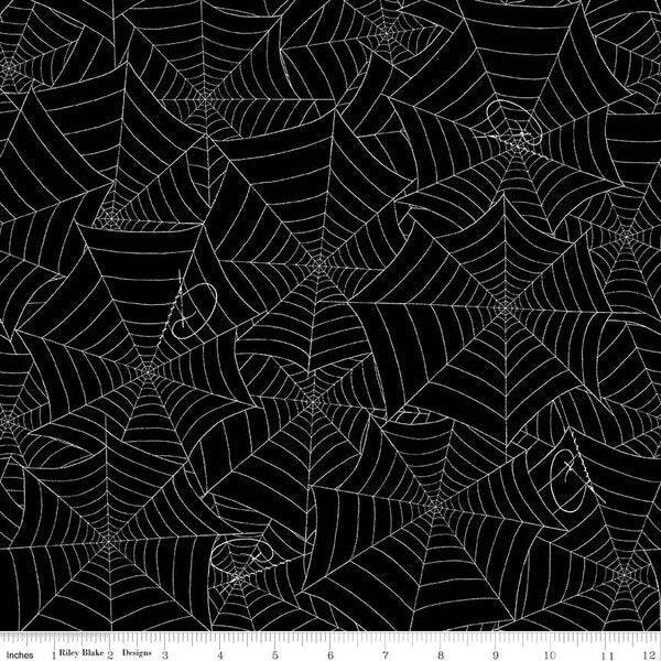 Black spiderweb print fabric with white web pattern, small scale