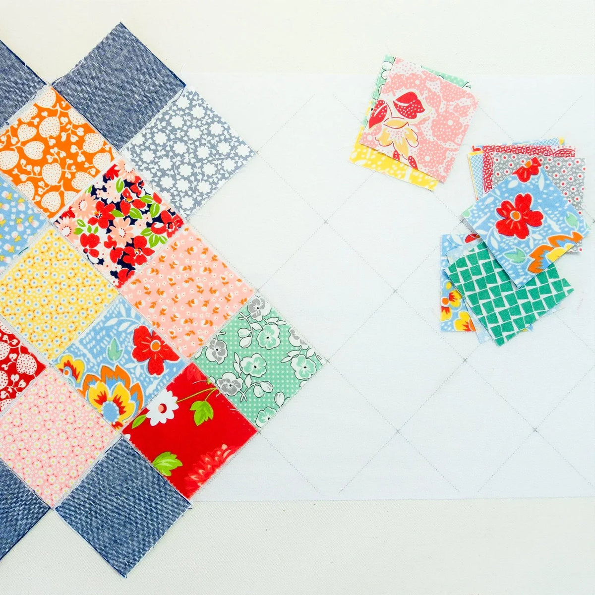 Patchwork border panel set with 1.5-inch squares and denim-style corner edges