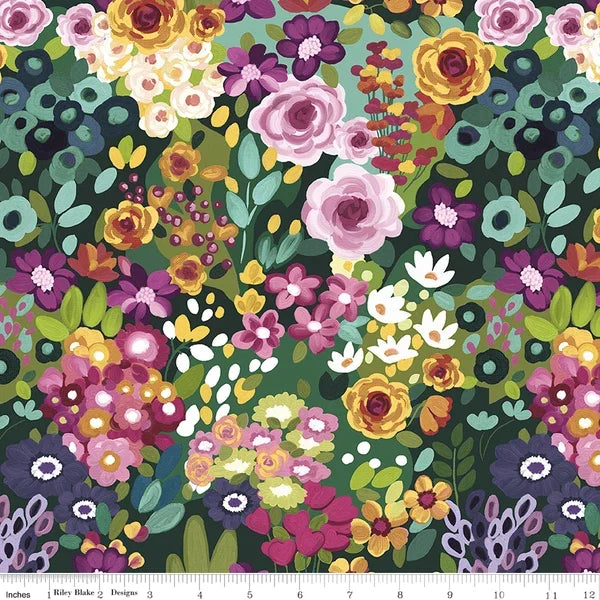 Floral cotton fabric on green background with roses and wildflower sprigs