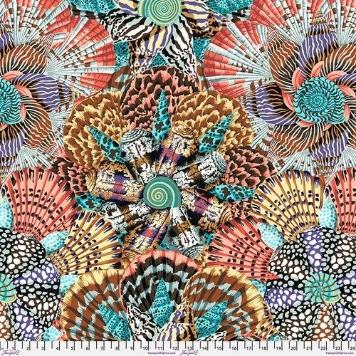 Colorful printed fabric with abstract animal, shell, and circular patterns