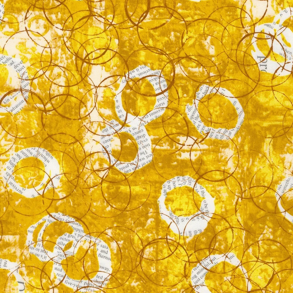 Yellow fabric with white circular text motifs and dark vine-like swirls