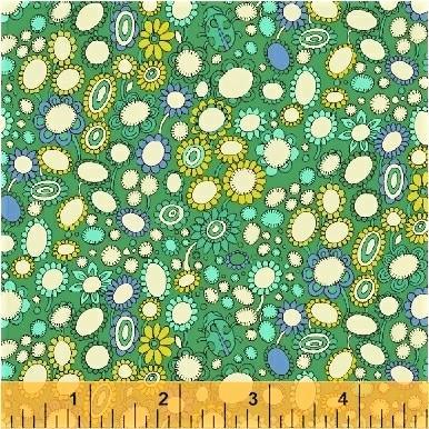 Green printed fabric with scattered floral and teardrop shapes pattern
