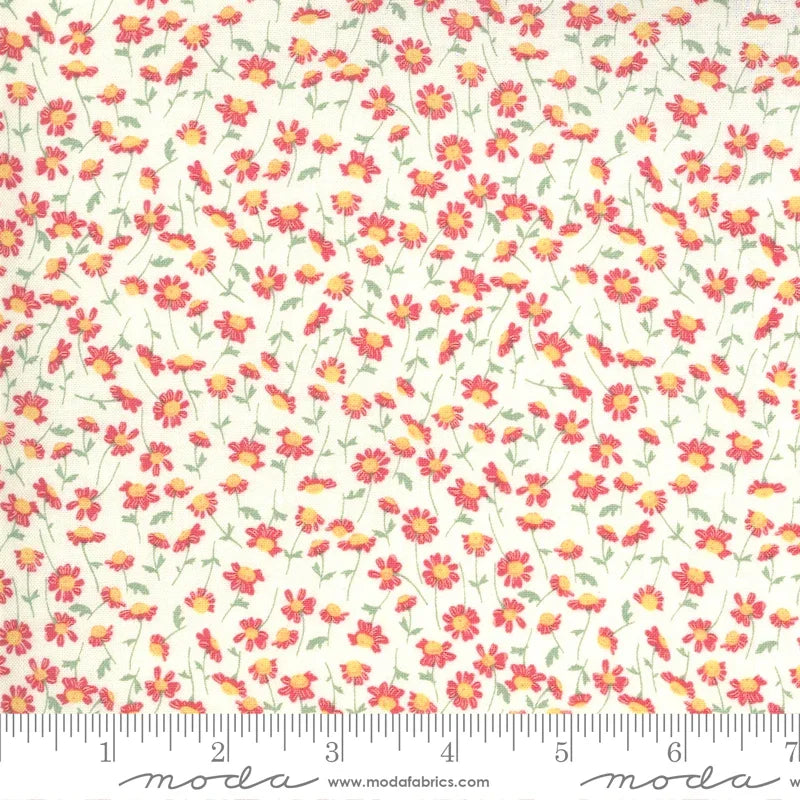 Ivory floral fabric with small pink, orange, and yellow blossoms