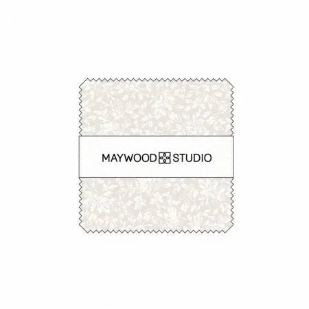 Printed fabric stack with light floral pattern, Maywood Studio branding