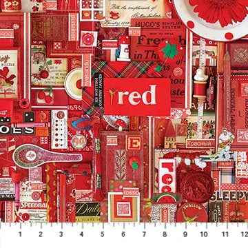 Red patchwork quilt fabric with holiday-themed prints and decorative blocks