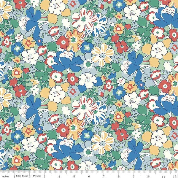 Floral cotton fabric with multicolor blossoms on teal-green background