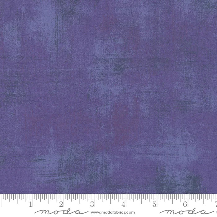 Grunge-style fabric swatch, mottled hyacinth-purple with subtle texture