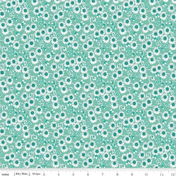 Teal cotton quilting fabric with small white and teal daisy floral pattern