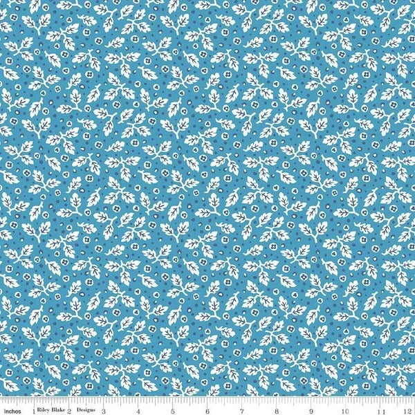 Blue cotton fabric with white leaf and stem pattern, Riley Blake