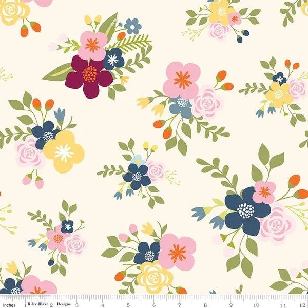 Cream floral fabric with mixed blossoms and leaves, scattered all-over pattern