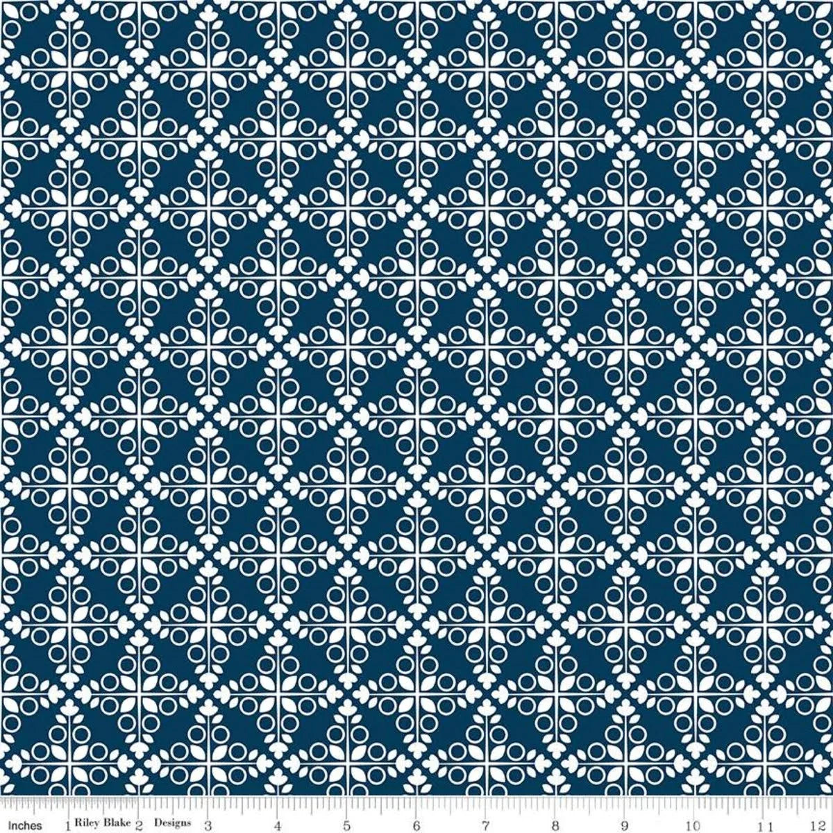 Navy trellis fabric with white and teal geometric lattice blocks pattern
