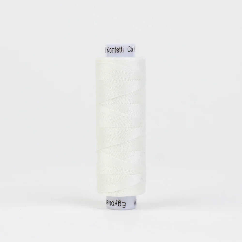 Soft white thread spool, neatly wound on a plastic core