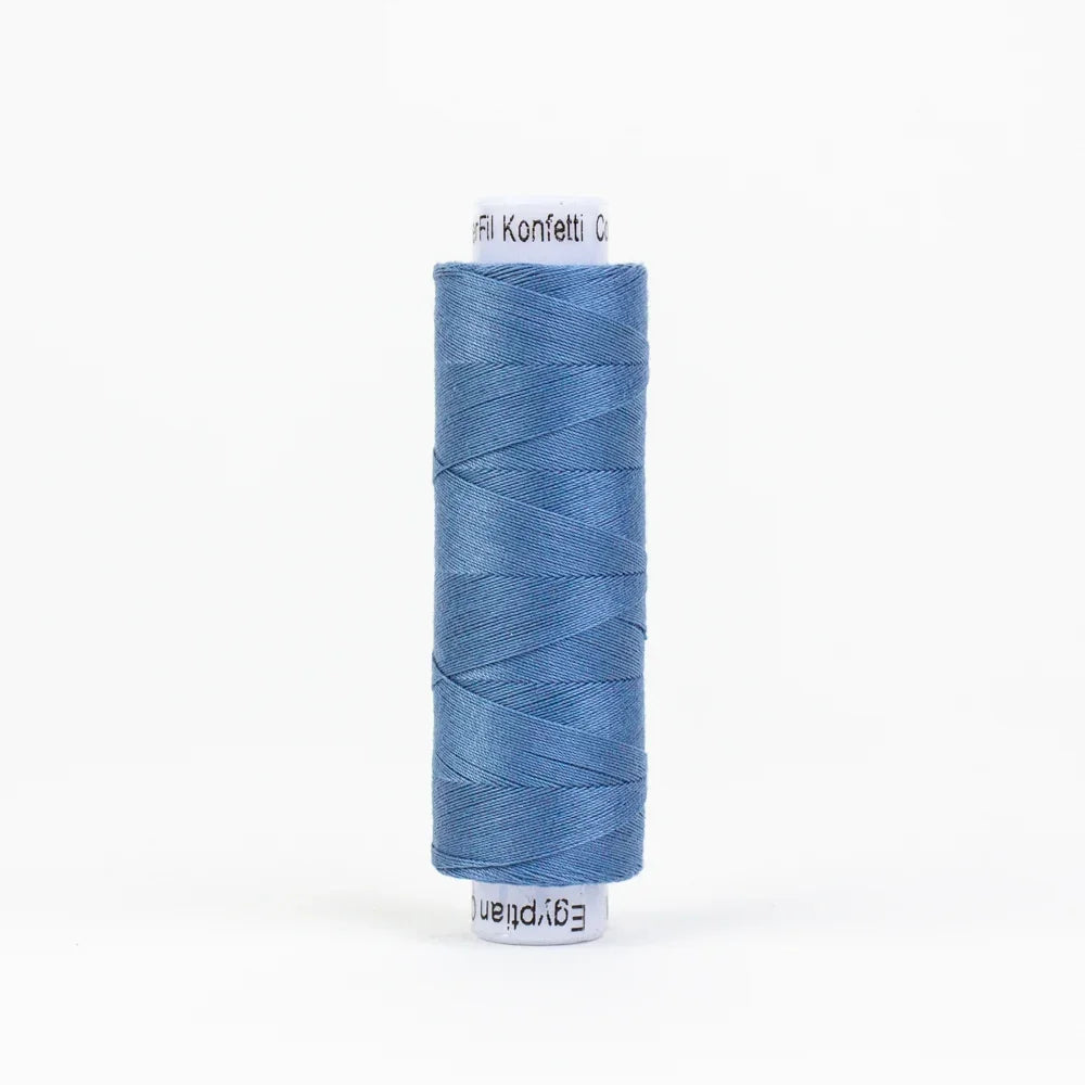 Blue thread spool on a tall bobbin, neatly wound