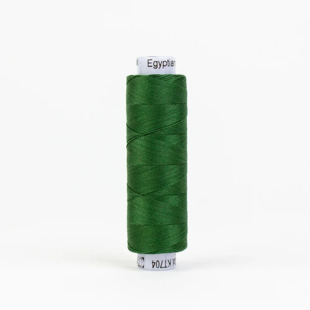 Thread spool in dark Christmas green, wound on a core