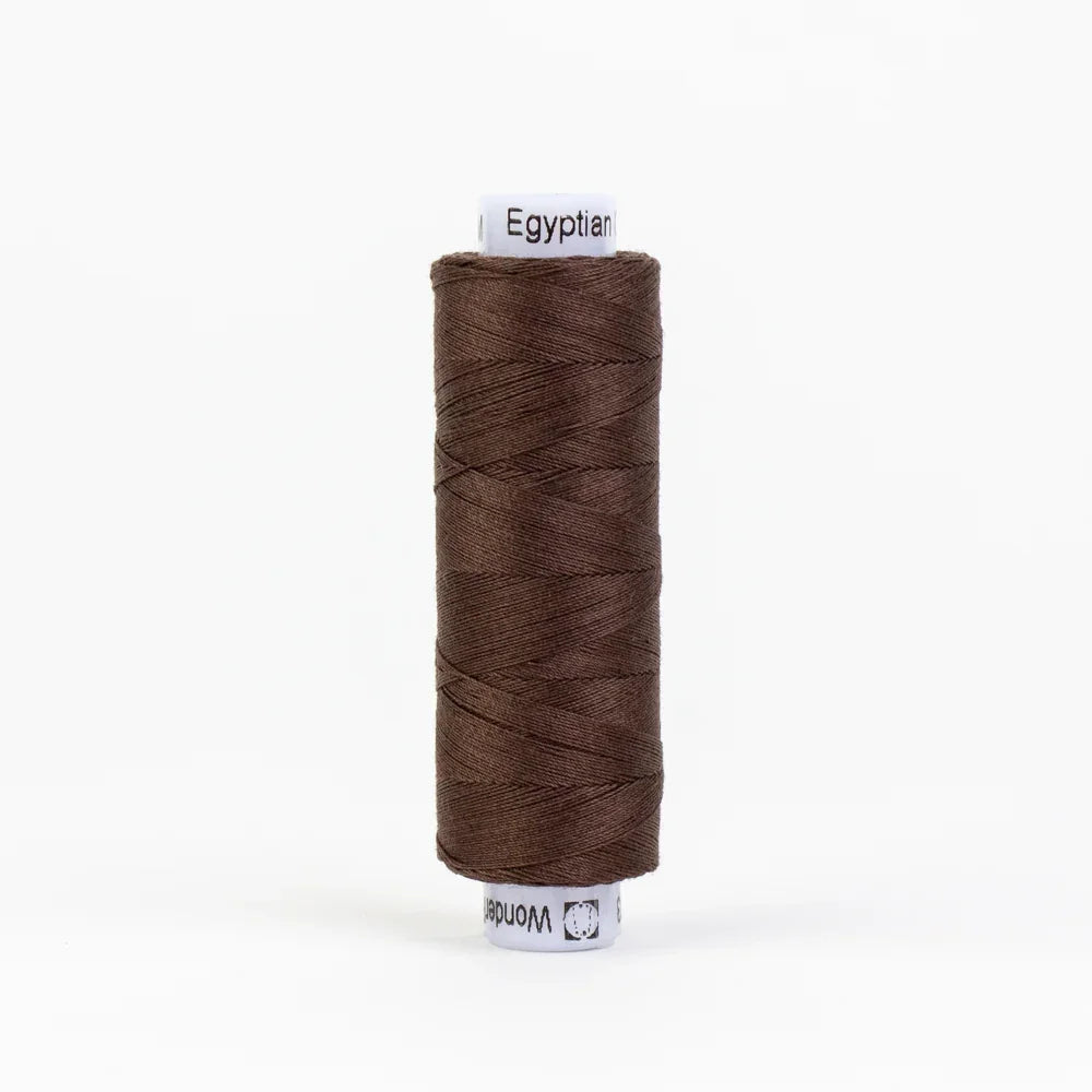 Spool of dark brown thread, Egyptian label