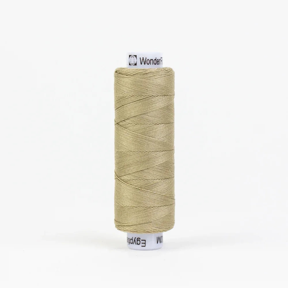 Tan embroidery thread spool, wound on a cylinder