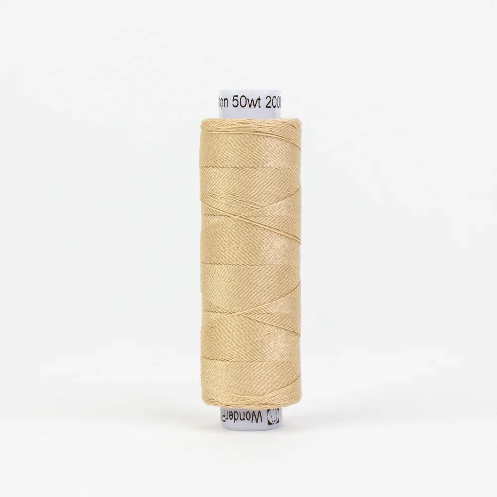 Spool of sewing thread, nude-beige with visible label