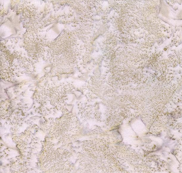 Cotton batik fabric with cream base and scattered light floral motifs