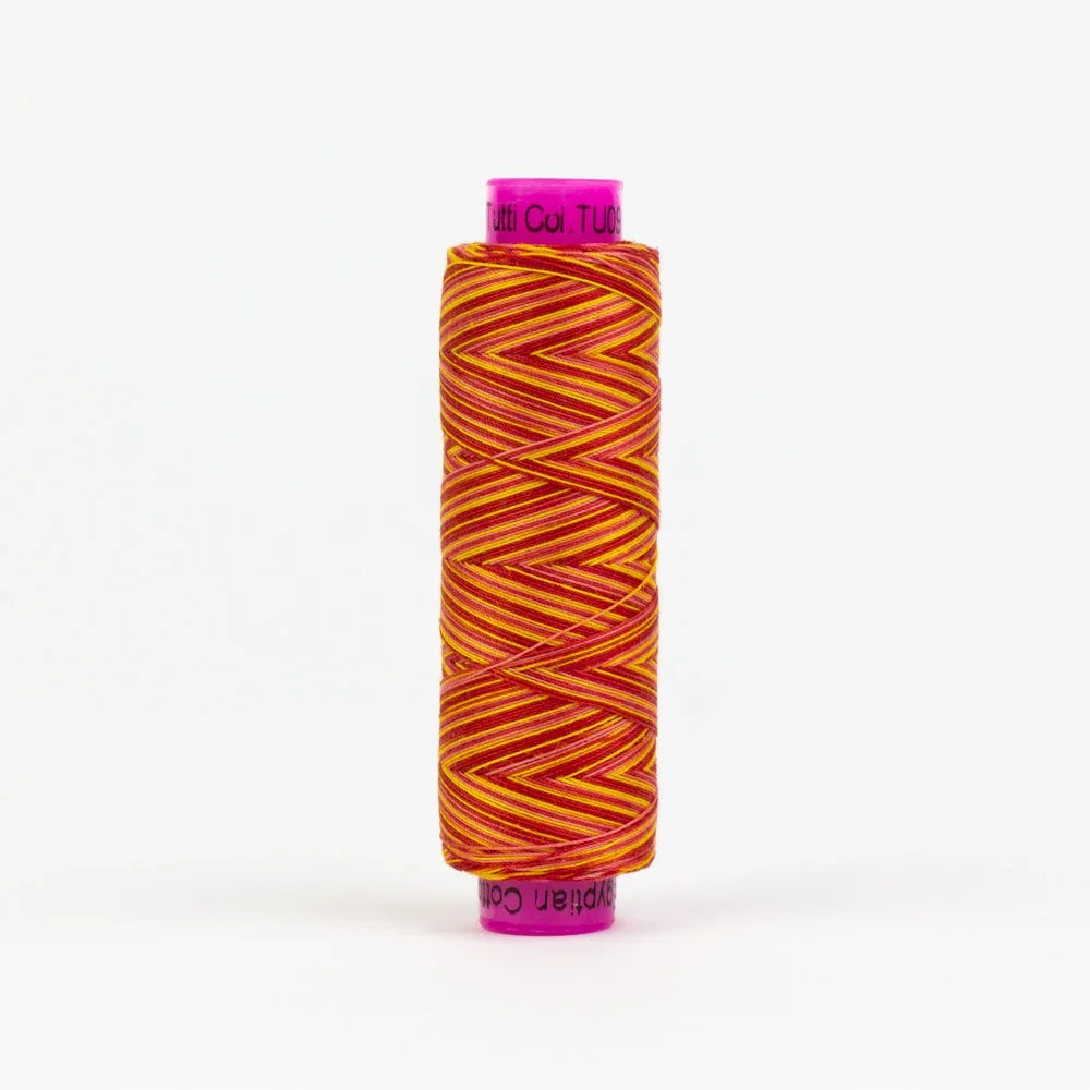 Orange zigzag thread spool with purple core and wrapped top