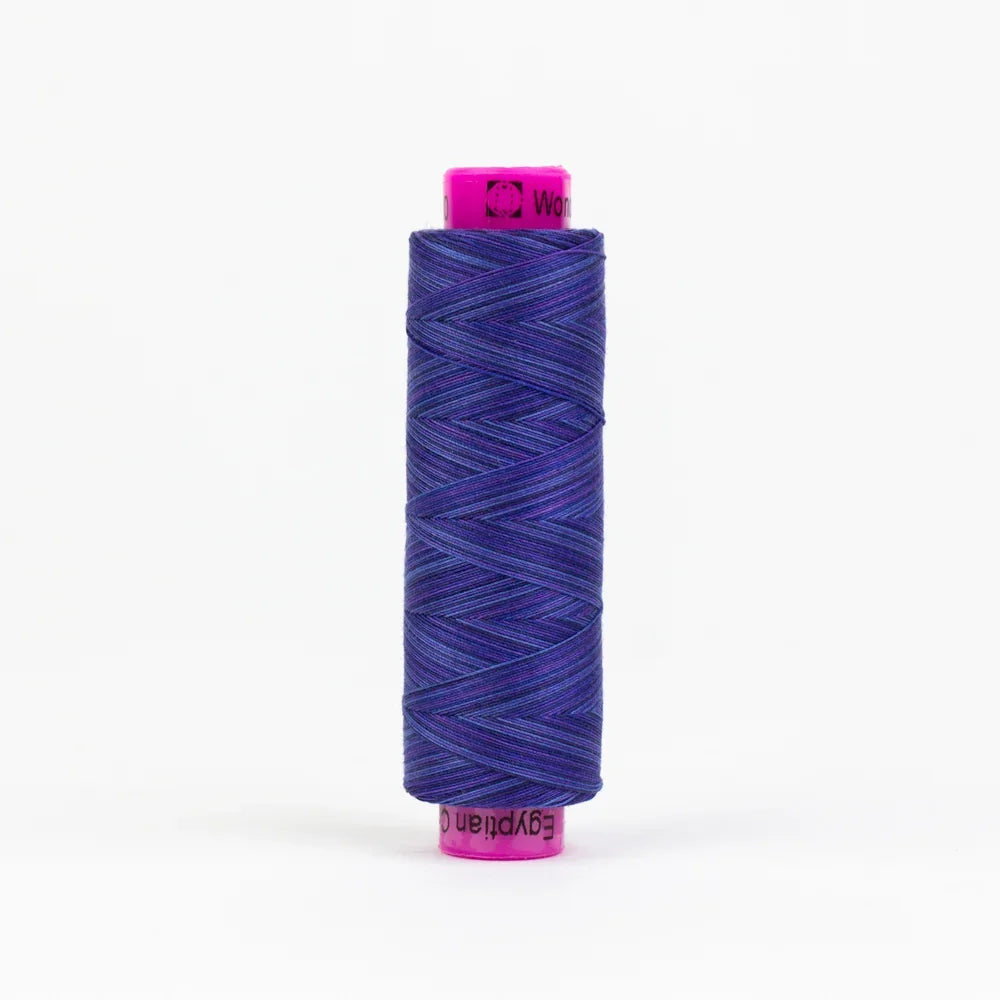 Spool of blue-purple yarn thread